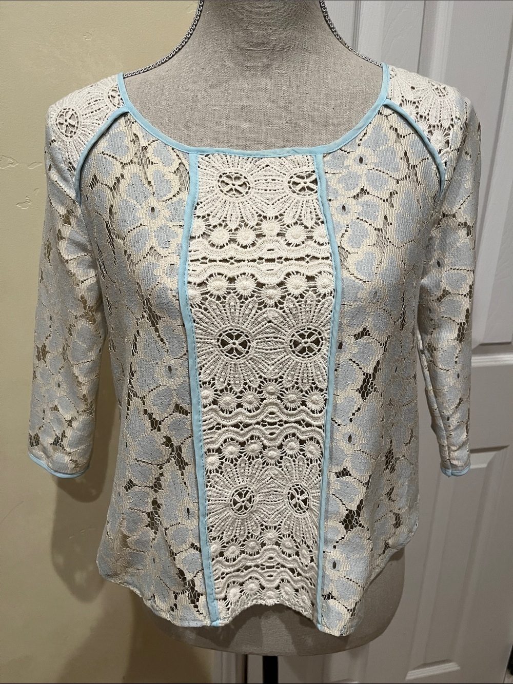 Lush Cream Lace Blouse with Light Blue Trim